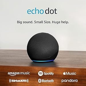 Black Amazon Echo Dot (5th Gen) smart speaker on a wooden table, featuring streaming service icons like Amazon Music, Spotify, Apple Music, Bluetooth, and Pandora below it, with the tagline “Big sound. Small size. Huge help.”