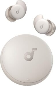 Soundcore A20i true wireless earbuds in beige with matching round charging case, compact in-ear design, Bluetooth connectivity, and portable all-day listening – featured in sound machine review 2025.