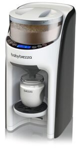 Baby Brezza Formula Pro Advanced automatic baby bottle maker in black and white design, dispensing formula into a bottle — one of the best baby bottle makers 2025 for fast, accurate, and hands-free feeding.